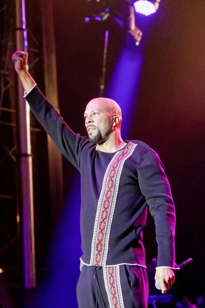 Common putting his fist up after performing his powerful latest single, Black America Again, at Union Park in Chicago, IL on Sunday Sept. 25, 2016 for the second annual AAHH! Fest. Photo courtesy of Tito Garcia 